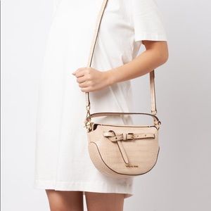 Michael Kors Emilia Half Moon crossbody In Buff